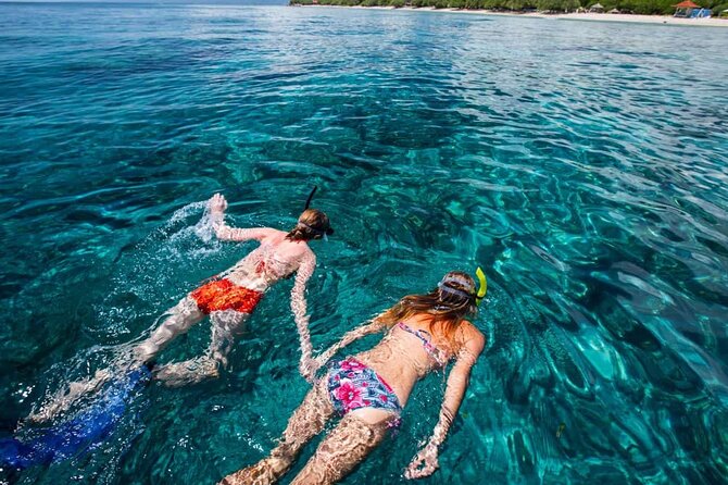All-Inclusive Bali Snorkeling at Blue Lagoon Beach & ATV Ride - Two hours, two sites, and the value of a traditional boat