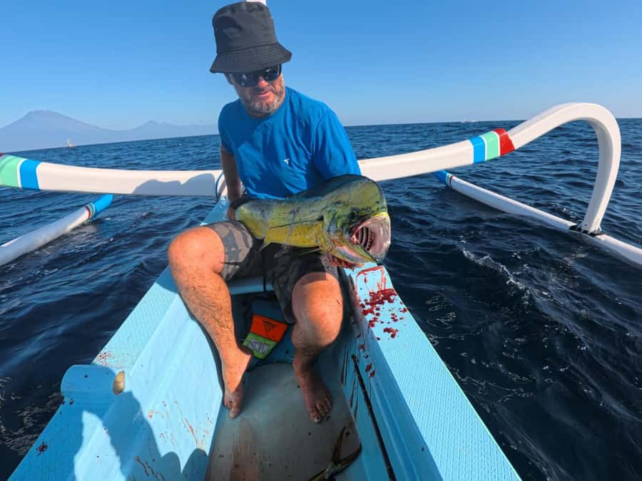 Amed: Private Sunrise Fishing & Catch-and-Cook Experience - Fishing for mahi-mahi, tuna, and bigger targets