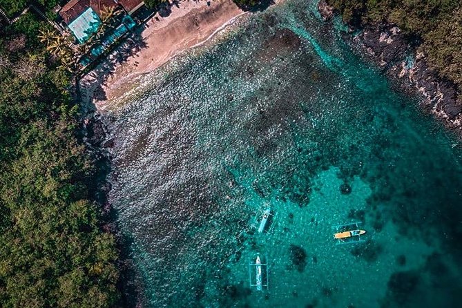 Bali Blue Lagoon and Tanjung Jepun Snorkeling with Transport - Getting ready at Blue Lagoon Beach