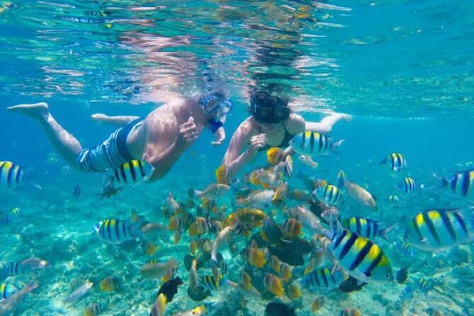 Bali Blue Lagoon Snorkeling with Private Transfer & Lunch - Boarding the traditional boat at Blue Lagoon