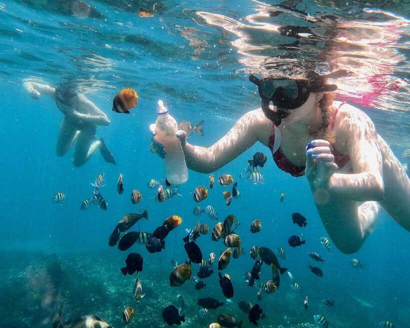 Bali: Blue Lagoon & Tanjung Jepun Snorkeling & lunch - The traditional boat ride between stops
