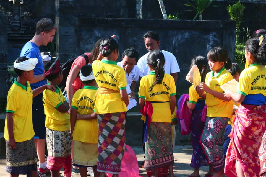 Bali Downhill Cultural Cycling Tour - Coffee with a priest and his family