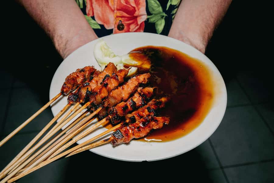 Bali: Food Tour of Denpasar with Over 15 Tastings - What the guide adds beyond the food