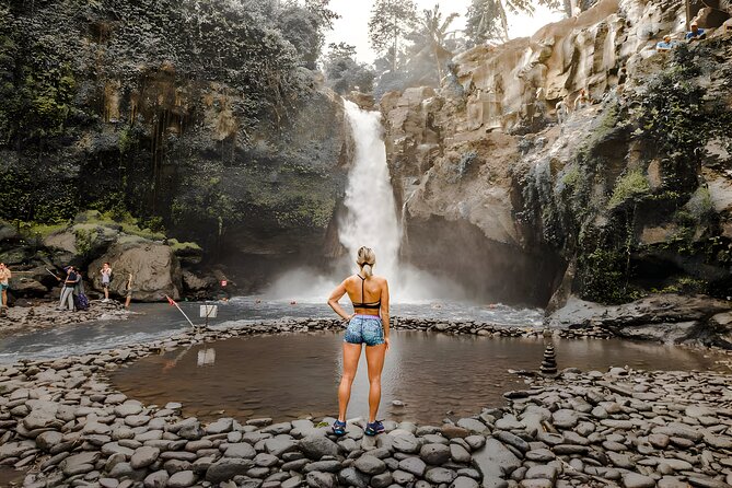 Bali Full-Day Car Charter: Ubud and Kintamani Volcano Tour - Tegenungan Waterfall begins the day with noise and motion