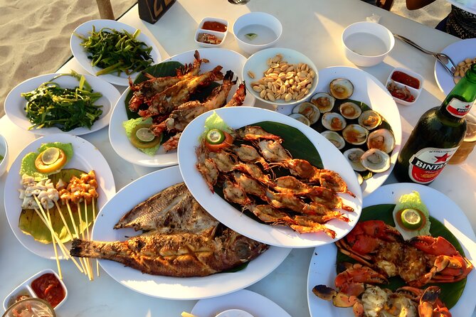 Bali Full Day-Tour: Denpasar City and Uluwatu Sunset Tour - Jimbaran Bay: seafood with your feet in the sand