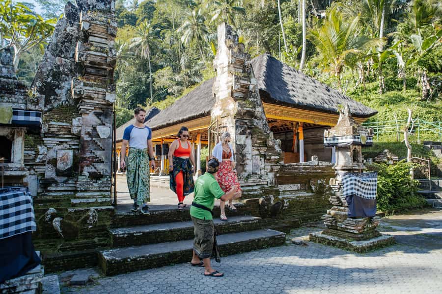 Bali: Hidden Canyon, Waterfall & Temples Small Group Tour - Tegenungan Waterfall and its long staircase