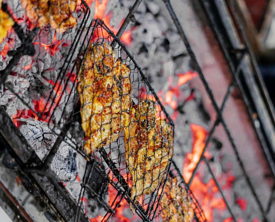 Bali: Jimbaran Seafood Market Tour with Sunset Dinner - Dinner on the sand at Jimbaran Bay