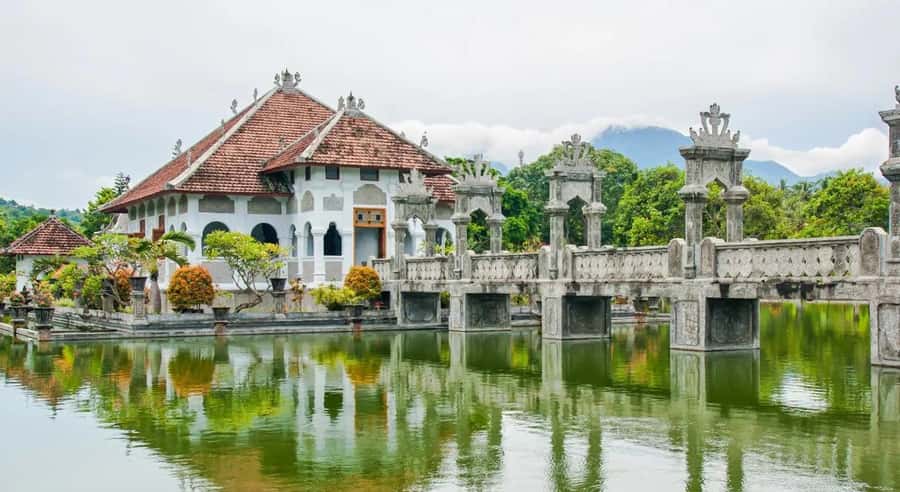 Bali: Lempuyang Temple, Tirta Gangga, and Taman Ujung Tour - Tirta Gangga’s koi ponds and stepping stones