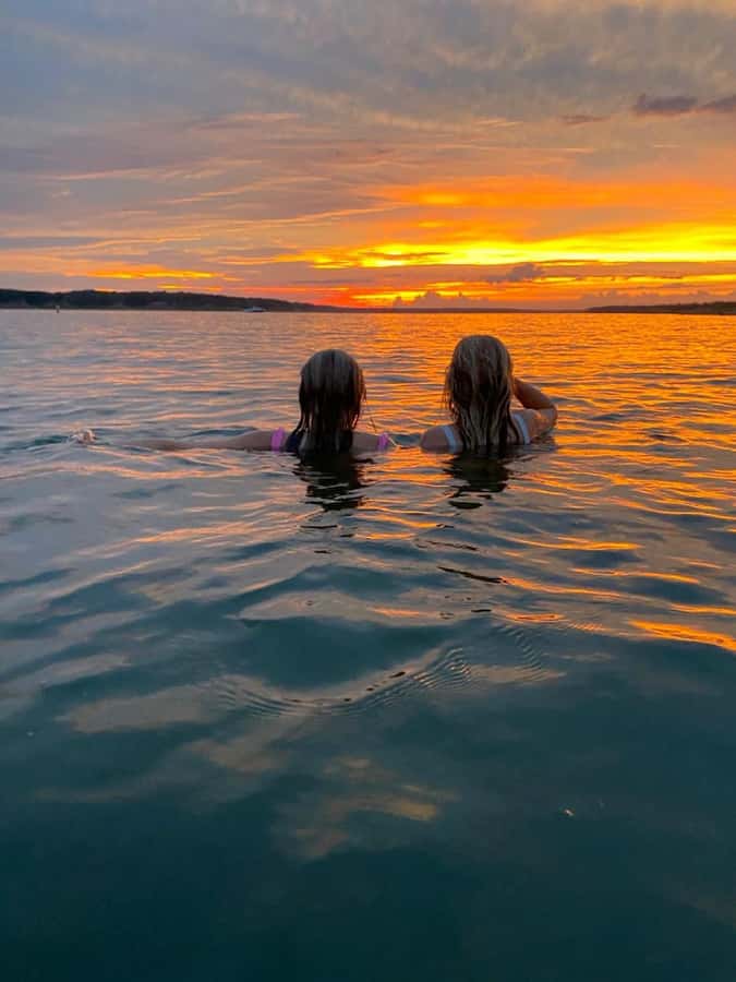 Bali: Lovina Sunset Tour with Snorkeling Experience - Boarding the boat at Lovina Beach