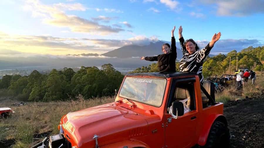 Bali: Shared Mount Batur Sunrise Jeep Tour with Hot Springs - Black lava fields and farming country