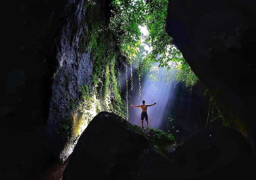 Bali: Tirta Gangga, Taman Ujung and Cepung Waterfall Trip - Tukad Cepung Waterfall: the day’s dramatic opening