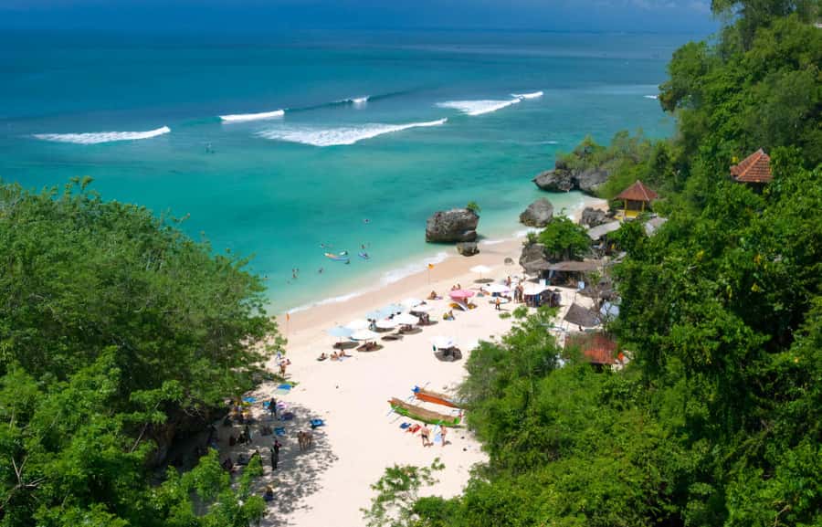 Bali: Uluwatu Beaches Tour with Padang Padang and Suluban - Suluban Beach begins the day below the cliffs