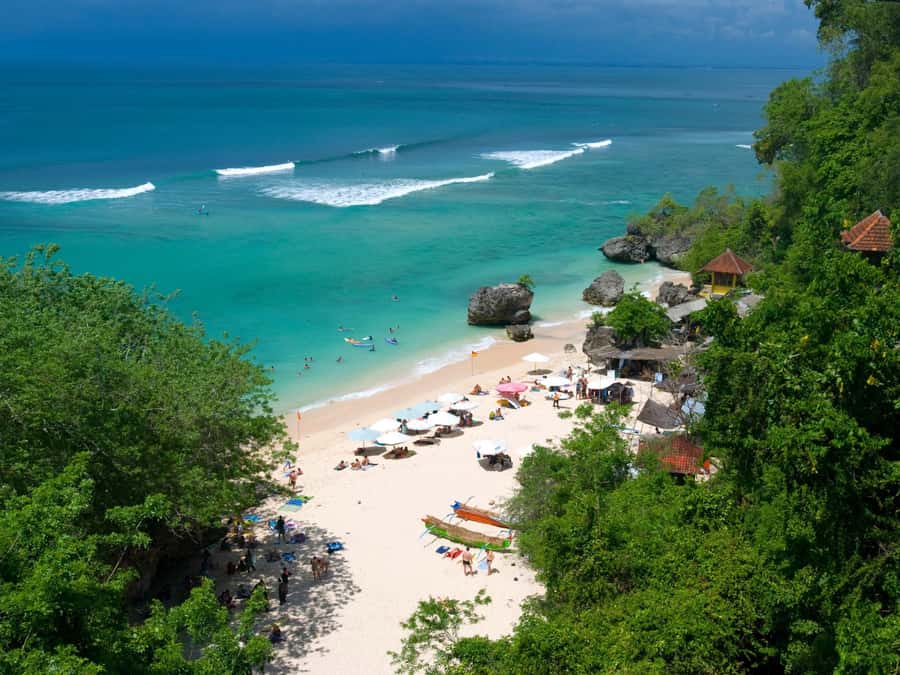 Bali: Uluwatu Temple, Kecak Dance, and Jimbaran Dinner Tour - Padang Padang Beach and the cliffside entrance