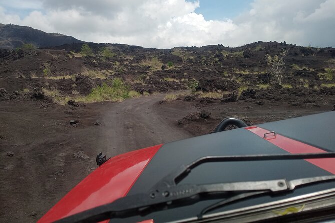 Batur Volcano Sunrise And Black Lava Jeep Adventure Tour - Black lava, volcanic sand, and the second half of the outing