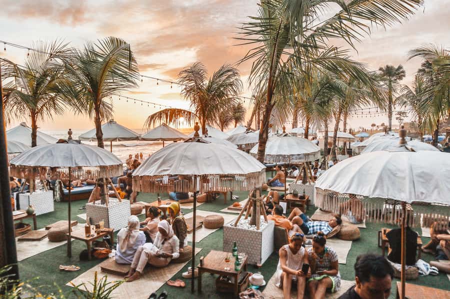 Canggu: Surfing Class, Tanah Lot & Kecak Dance Sunset Tour - Tanah Lot at the edge of the sea