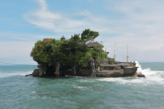Full Day Private Tour to Ubud Waterfall and Tanah Lot Sunset - Taman Ayun brings gardens and royal temple design