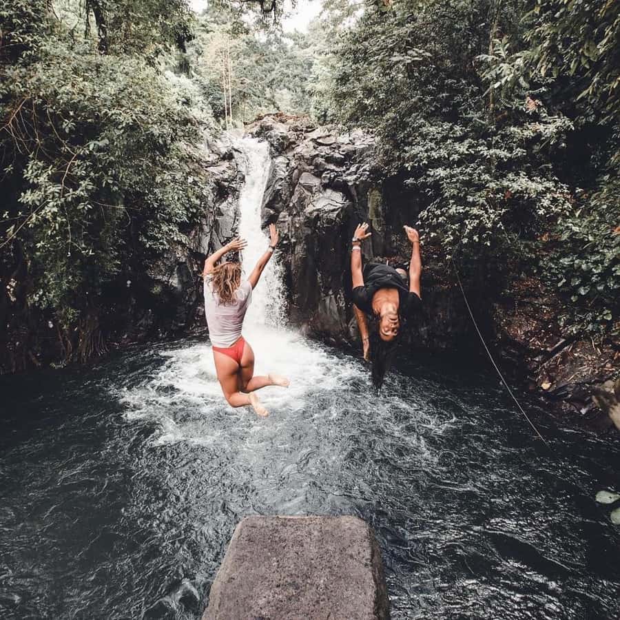 Jumping Sliding at Aling- Aling Waterfall and Handara Gate - The 35-meter Aling Aling photo stop