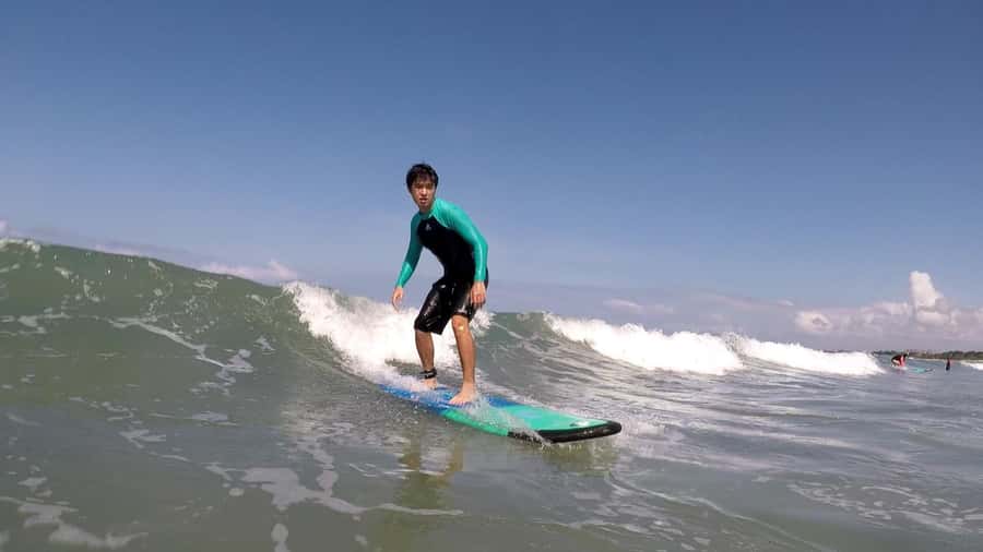 Legian Beach, Bali: Beginner or Intermediate Surf Lessons - Getting into the water at Legian