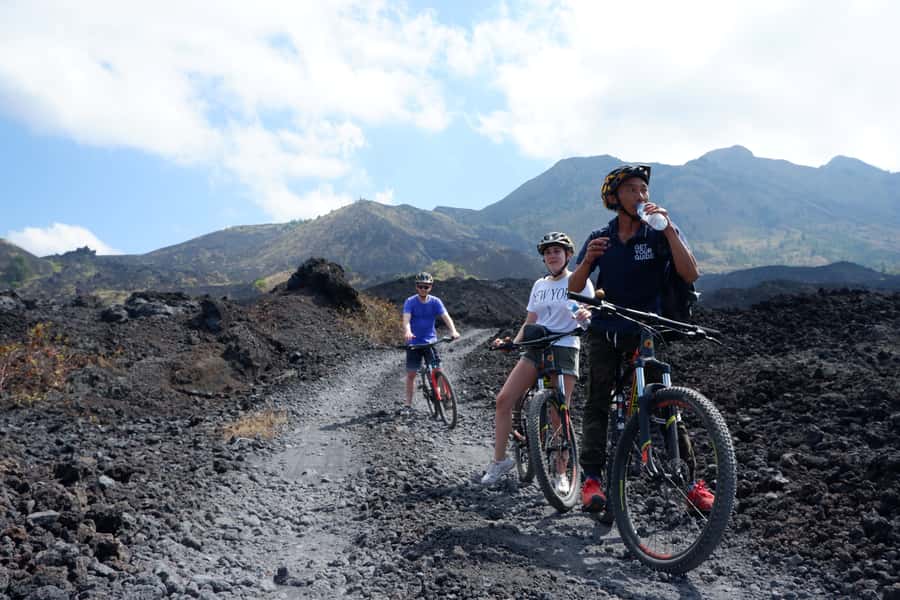 Mount Batur: Black Lava Cycling Tour w/ Natural Hot Spring - Soaking at the natural hot spring