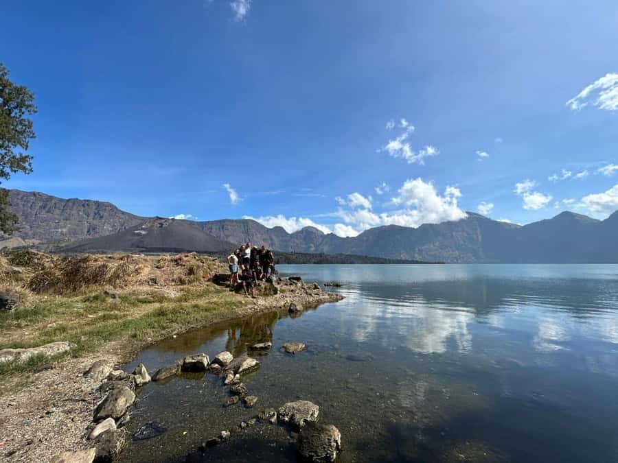 Mount Rinjani Trek 3D-2N To Summit - Lake - Hotspring - Day two: summit sunrise, volcanic gravel, lake views, and hot springs