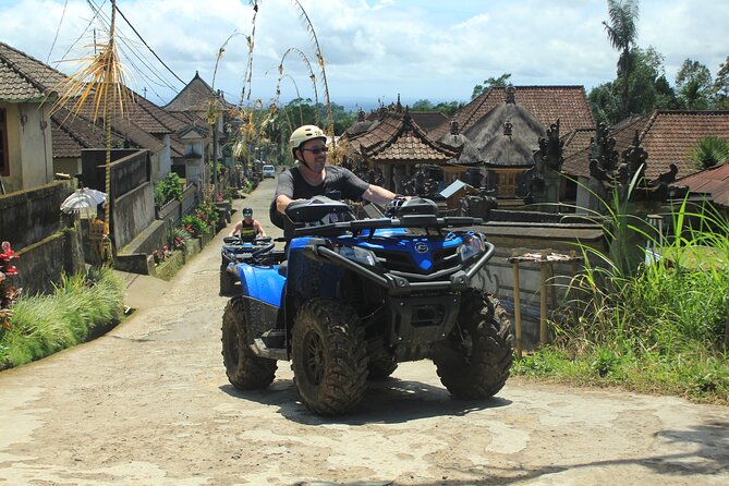 Quad or Buggy Tour with Canyon Tubing Adventure in Bali - Changing rooms, lockers, and the photographer