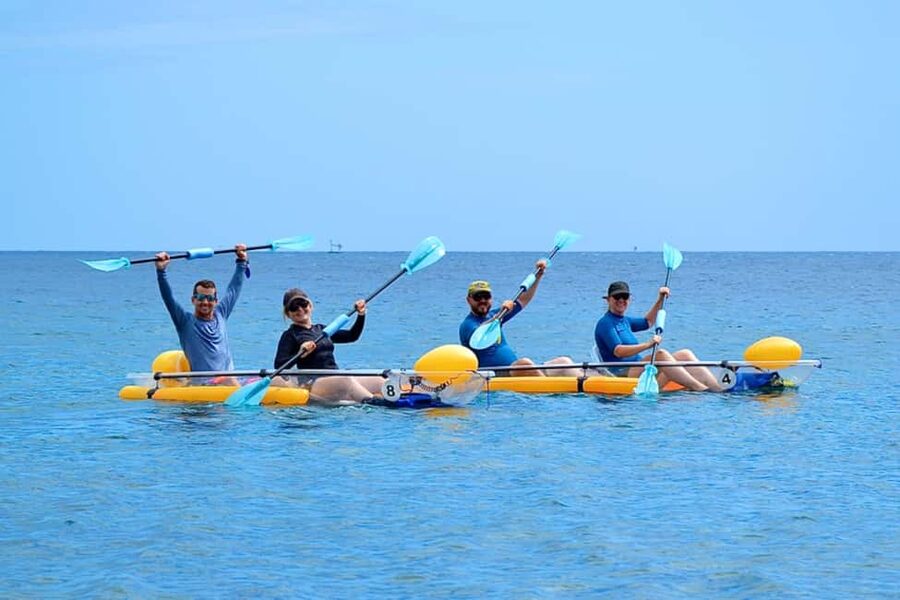 Transparent kayak and stand up paddle rental - Looking through Amed’s clear kayaks