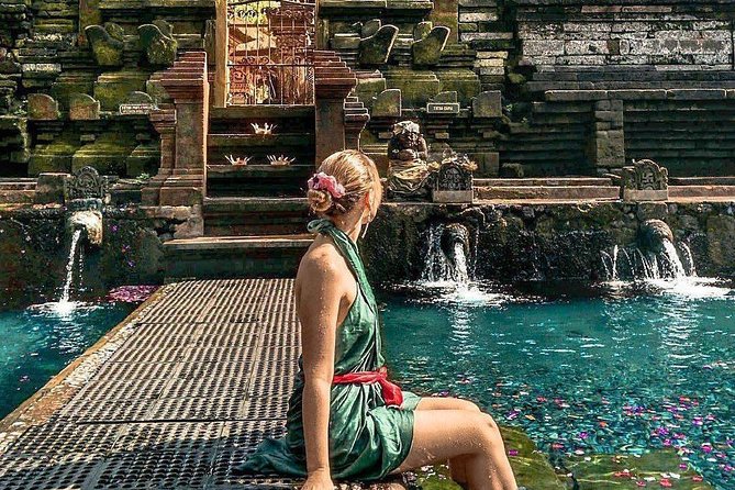 Ubud Jungle Swing, Temple & Waterfall Tour (Private Half Day Tour) - Kanto Lampo Waterfall and Dark Rock Formations